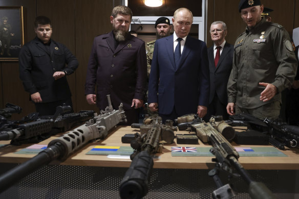 Russian President Vladimir Putin, accompanied by head of the Chechen Republic Ramzan Kadyrov, inspects NATO military trophies captured in battles in Ukraine, in Gudermes, Chechen Republic, Russia.