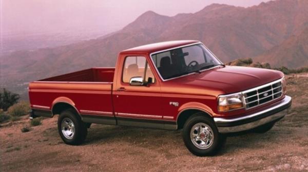 1992 Ford F-Series pickup truck parked in mountains